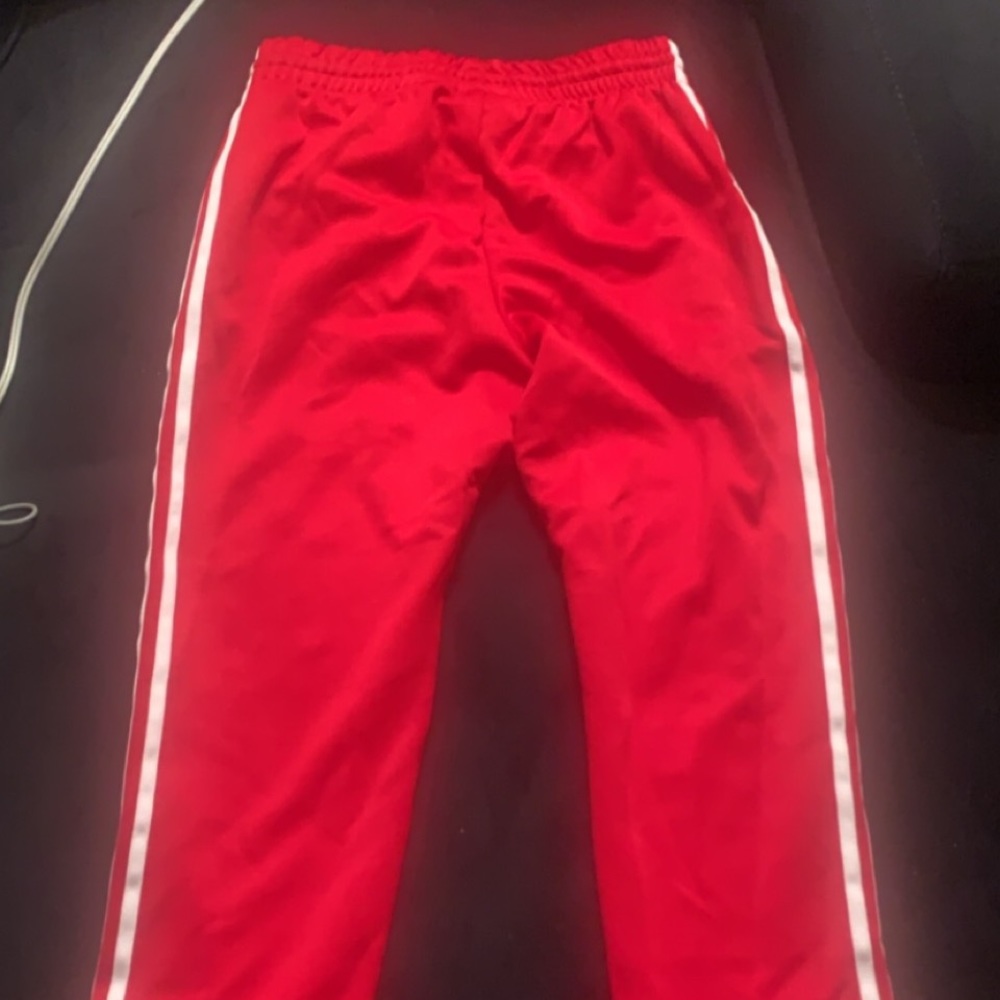 Red adidas track suit pants